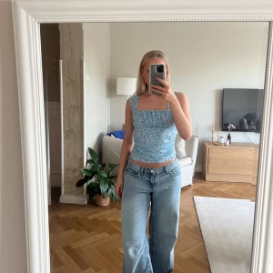 Blå blommig topp - Helt oanvänd 