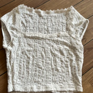 Kort topp - Topp som är använd ett par ggr. 