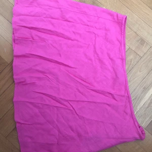 Sommarkjol - Kort rosa kjol.