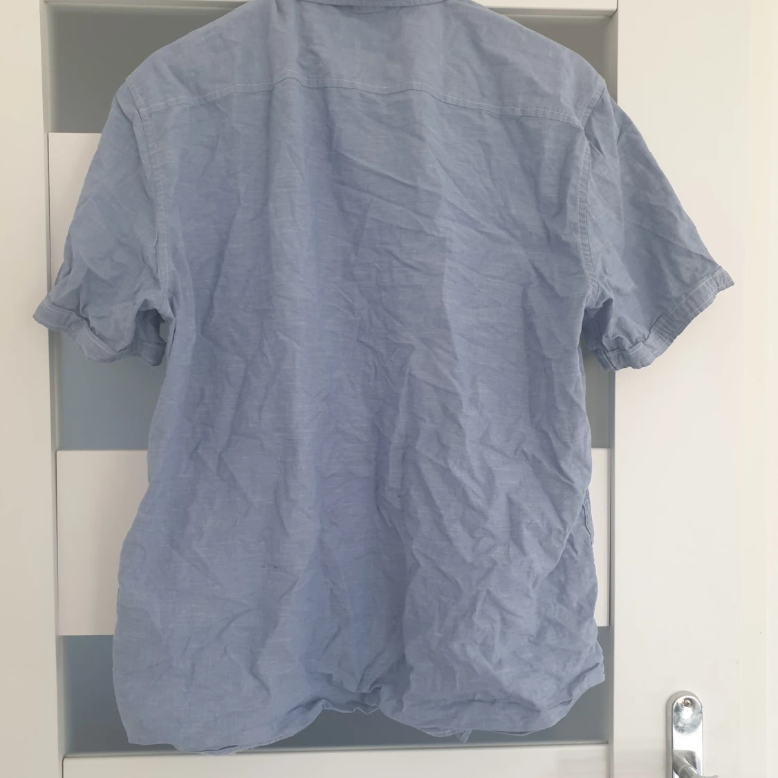 Ljusblå skjorta  - 90