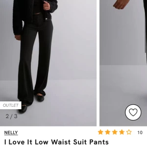 I Love It low Waist Suit Pants  - Säljer mina kostymbyxor från Nelly då dom är för stora för mig. Jättefina förutom defekt vid ena benet (se bild) Tycker däremot inte de syns när man har på sig dom. Men har dragit ner priset pga det. 