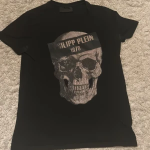 Philipp Plein T-shirt - En svart Philipp Plein T-shirt i bra skick 