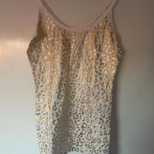 Leopard linne - Mycket fint skick, stretchig i materialet 