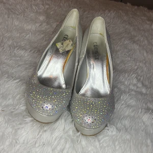 Glitter klackar  - Silvriga glitter klackar 