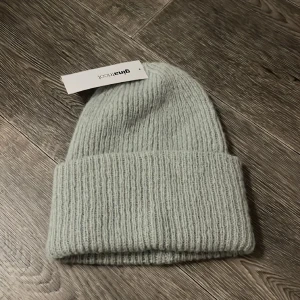 Mössa från Gina  - Helt ny oanvänd mössa från ginatricot Onesize 
