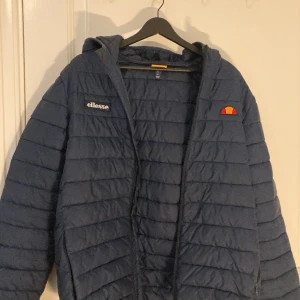 Ellesse Blue Puffer - Size L. Barely worn and bought 3 months ago. Selling because moving overseas