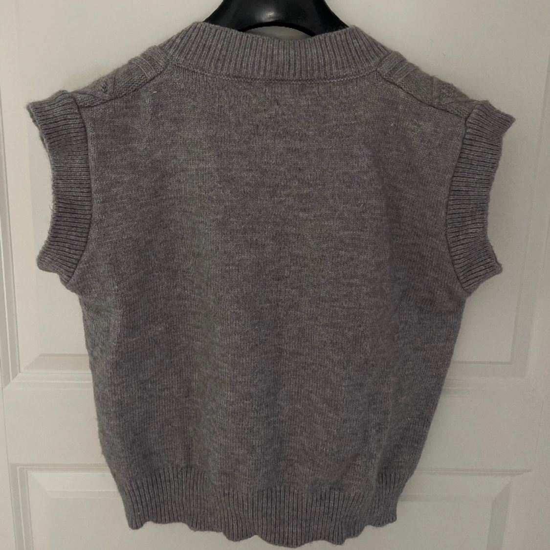 Stickad pullover / väst - 90