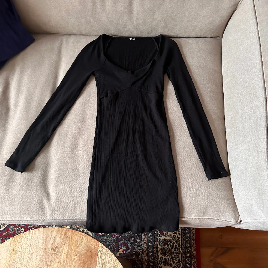 Tajt långärmad klänning