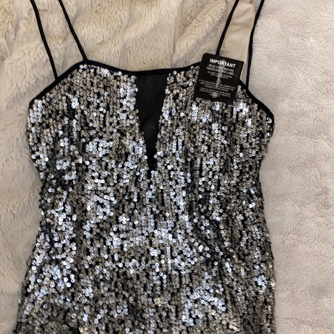 Glitter fest topp Rebecca Stella