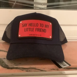 John  hatter & co keps - John  hatter & co keps jätte fin och är oanvänt 