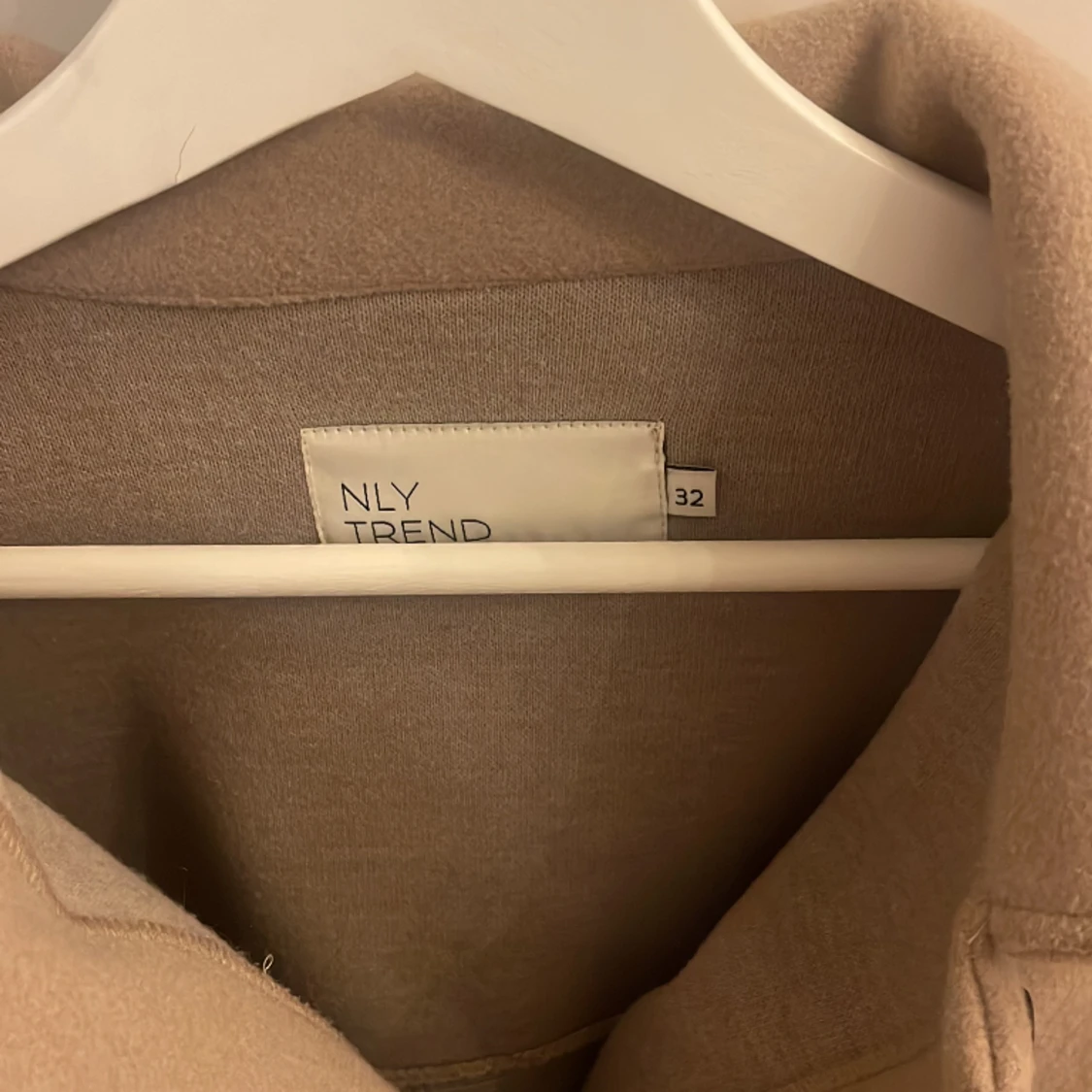 Kort kappa från Nelly - 90