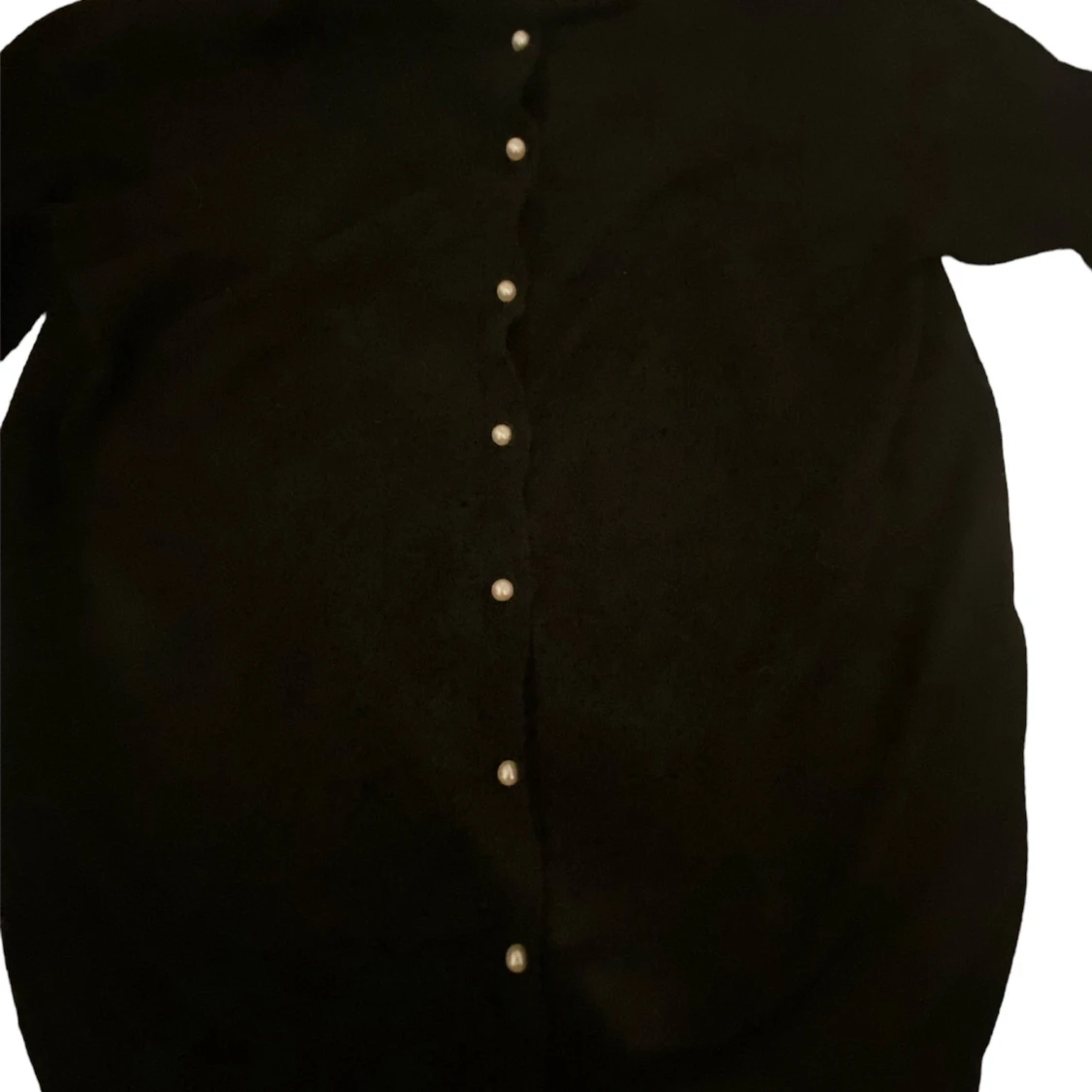 Svart kofta med pärlor 