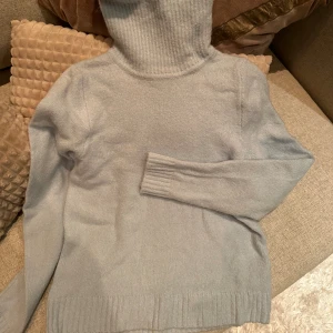 Stickad tröja  - Från New Yorker