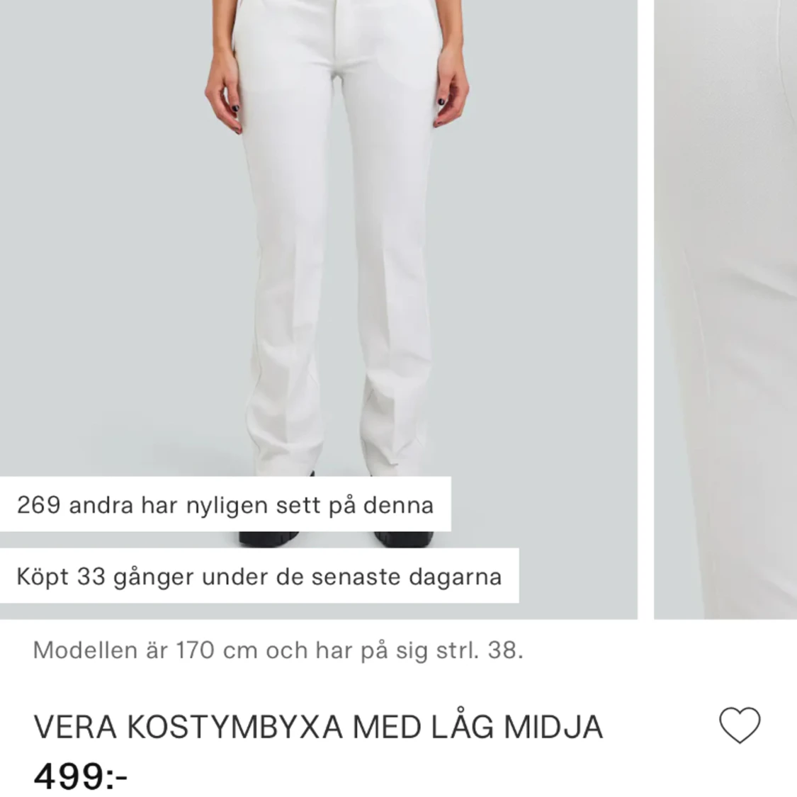 Lågmidjade vita kostymbyxor 