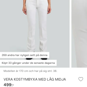 Lågmidjade vita kostymbyxor  - Använder aldrig har använt 2 gånger tidigare.