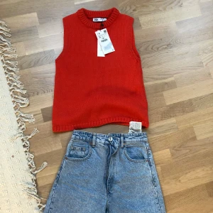 Stickad väst - Helt ny 