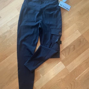 Firmabs träningstajts  - Aldrig använda, storlek US M, svarta 