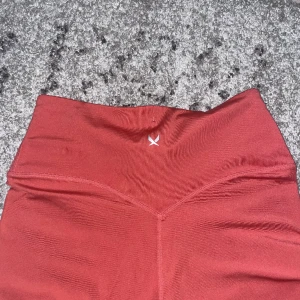 Tränings tights - Aldrig använda, lite korta i benen, korallfärgade typ