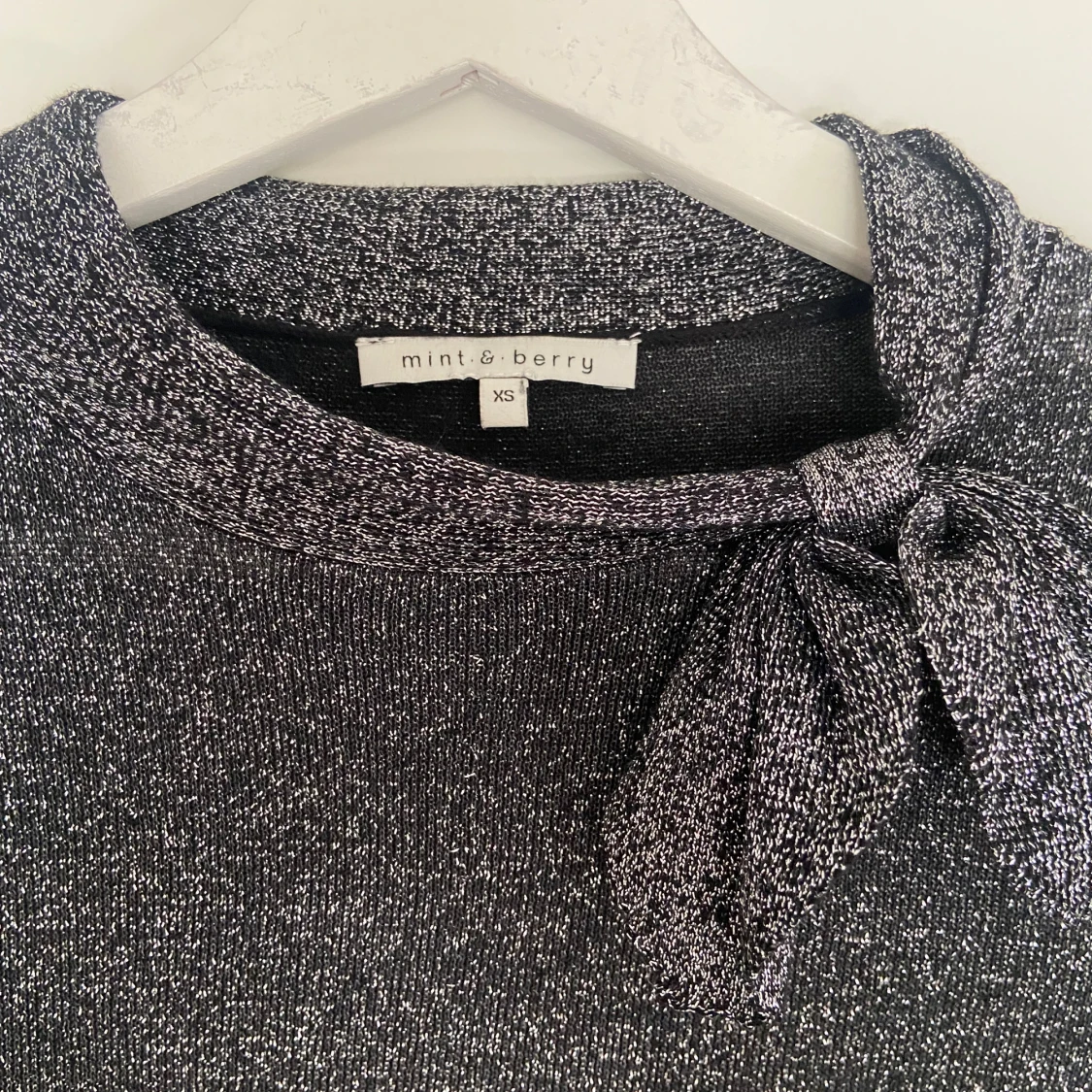 Glittrig topp/tröja - 90