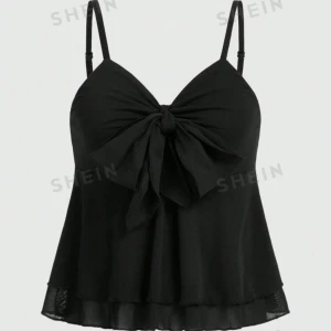 Svart topp med rosett  - Använd fåtal gånger , skriv för fler bilder eller frågor 