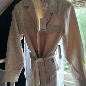 Kavaj jacka - Med knytband linnematerial