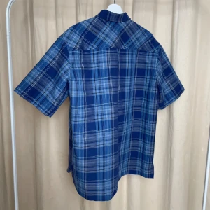 Rutig skjorra - Helt okej skick