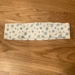 Floral white blue and green flowers worn 3 times