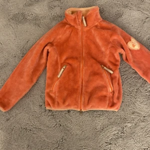 Ridkofta  - En jätte skön och varm tidkofta har päls inuti och utanför 