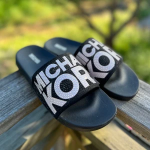 Michael Kors tofflor  - Helt nya, aldrig använda.