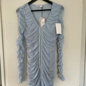 Klänning  - Jätte fin blå klänning oanvänd