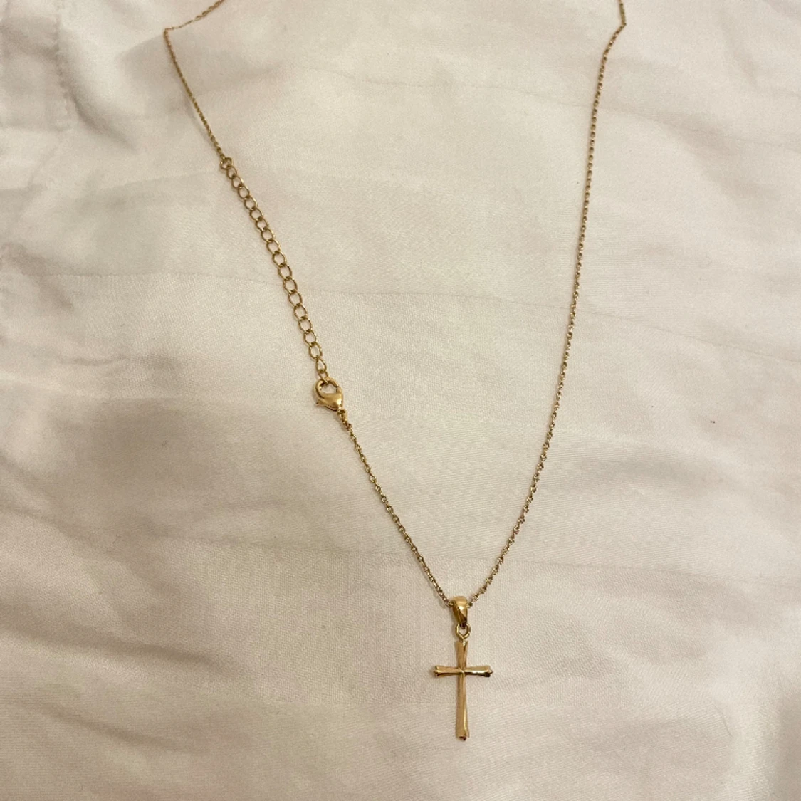 Korshalsband doppat i guld  - 90