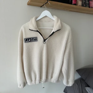 Vit tjocktröja - Vit tjocktröja med dragkedja 