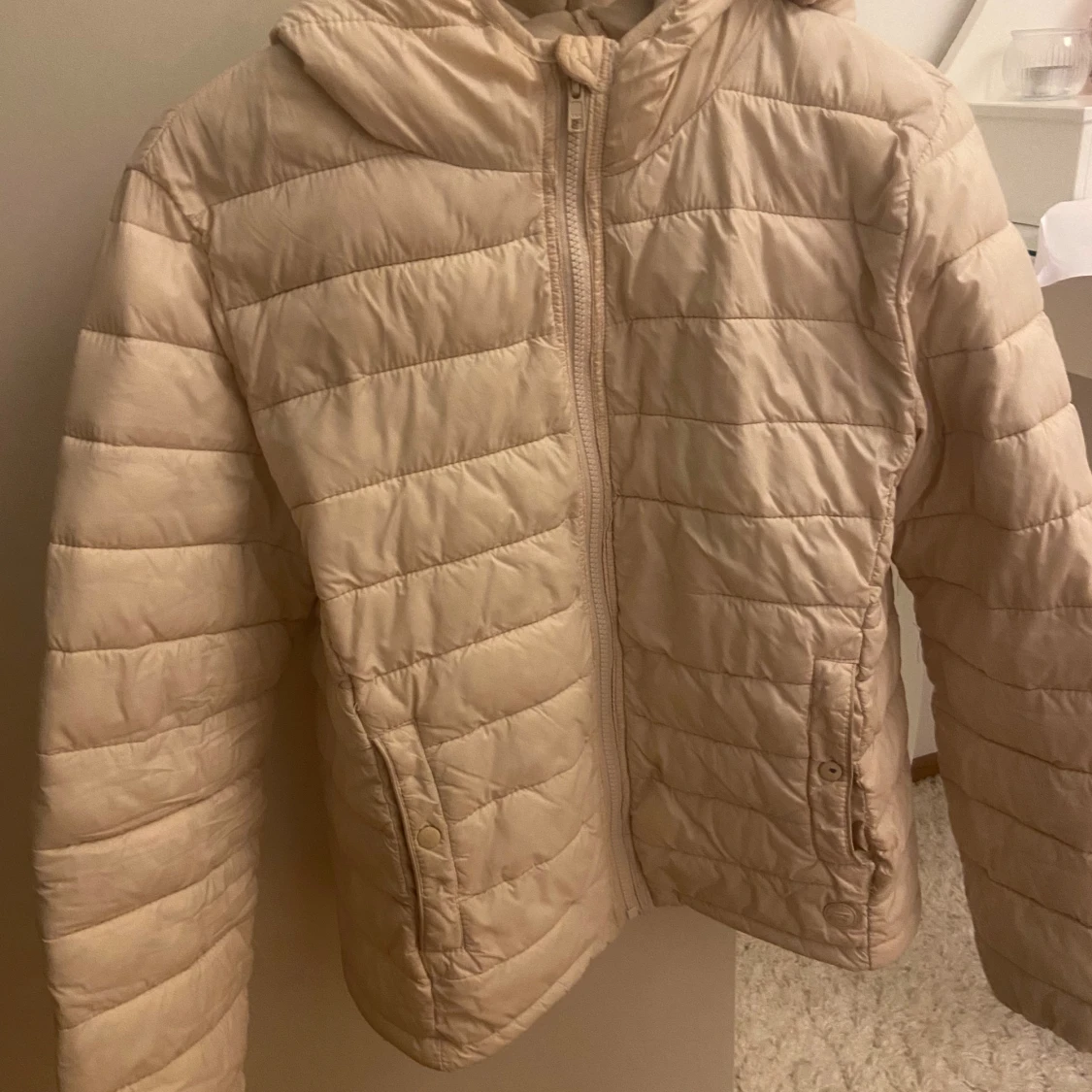 Ljusrosa puffer jacka 