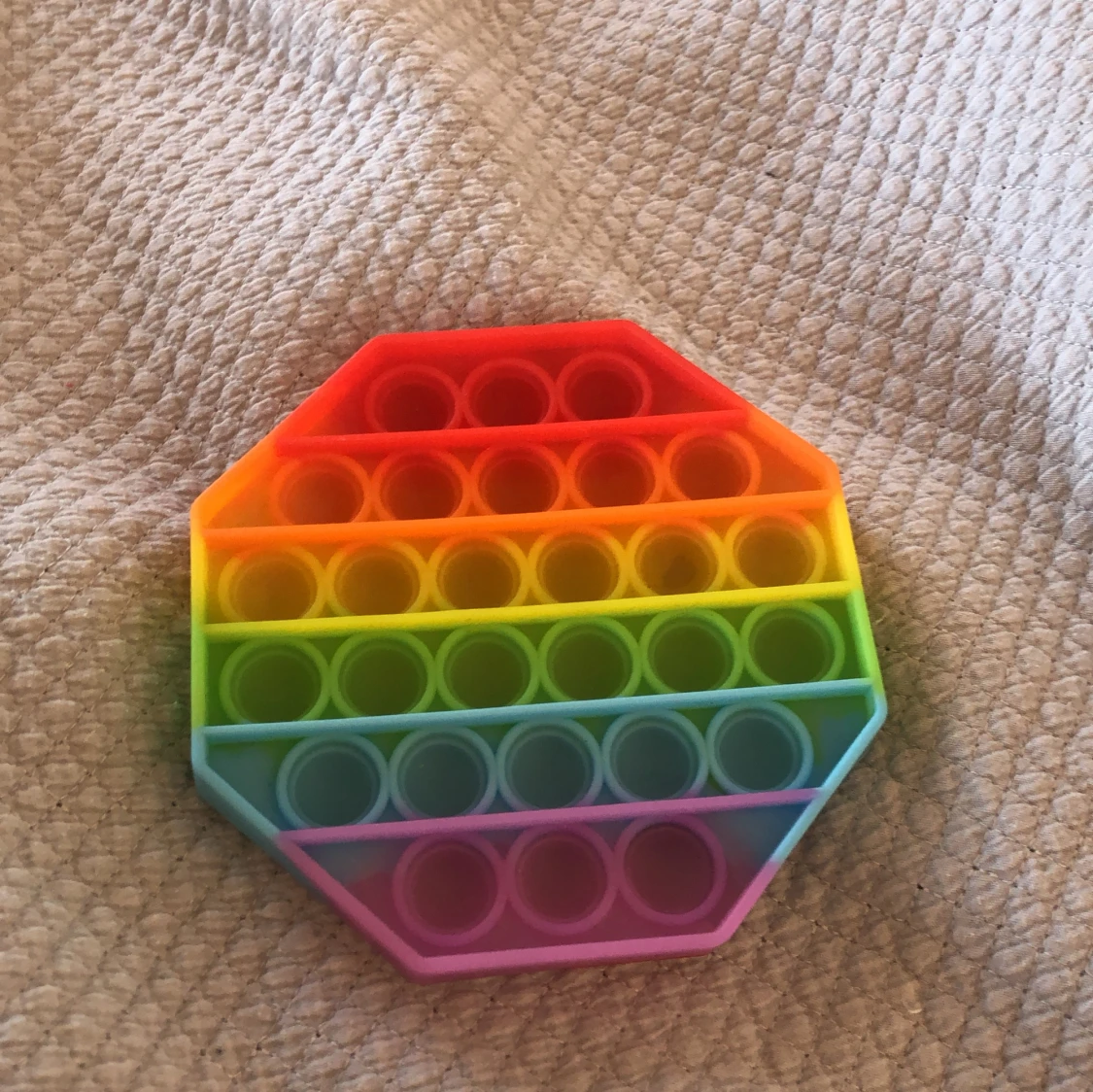 Regnbågig poppit - 91