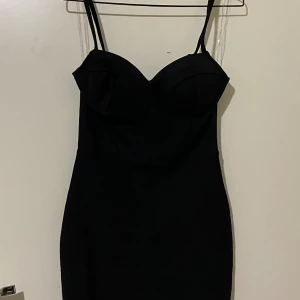 Black Dress  - Har inte haft den på mig eller använt den.