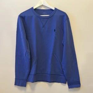 Ralph Lauren collegetröja - Tröjan är i storlek M. Bra skick.