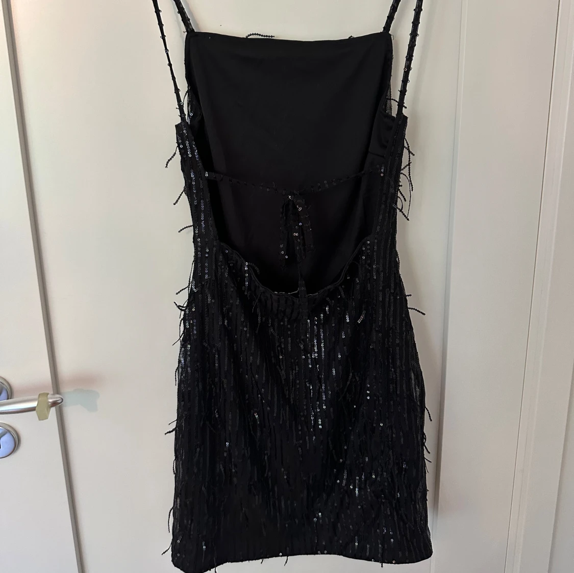 Glittrig klänning - 90