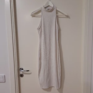 Klänning  - Storlek s 