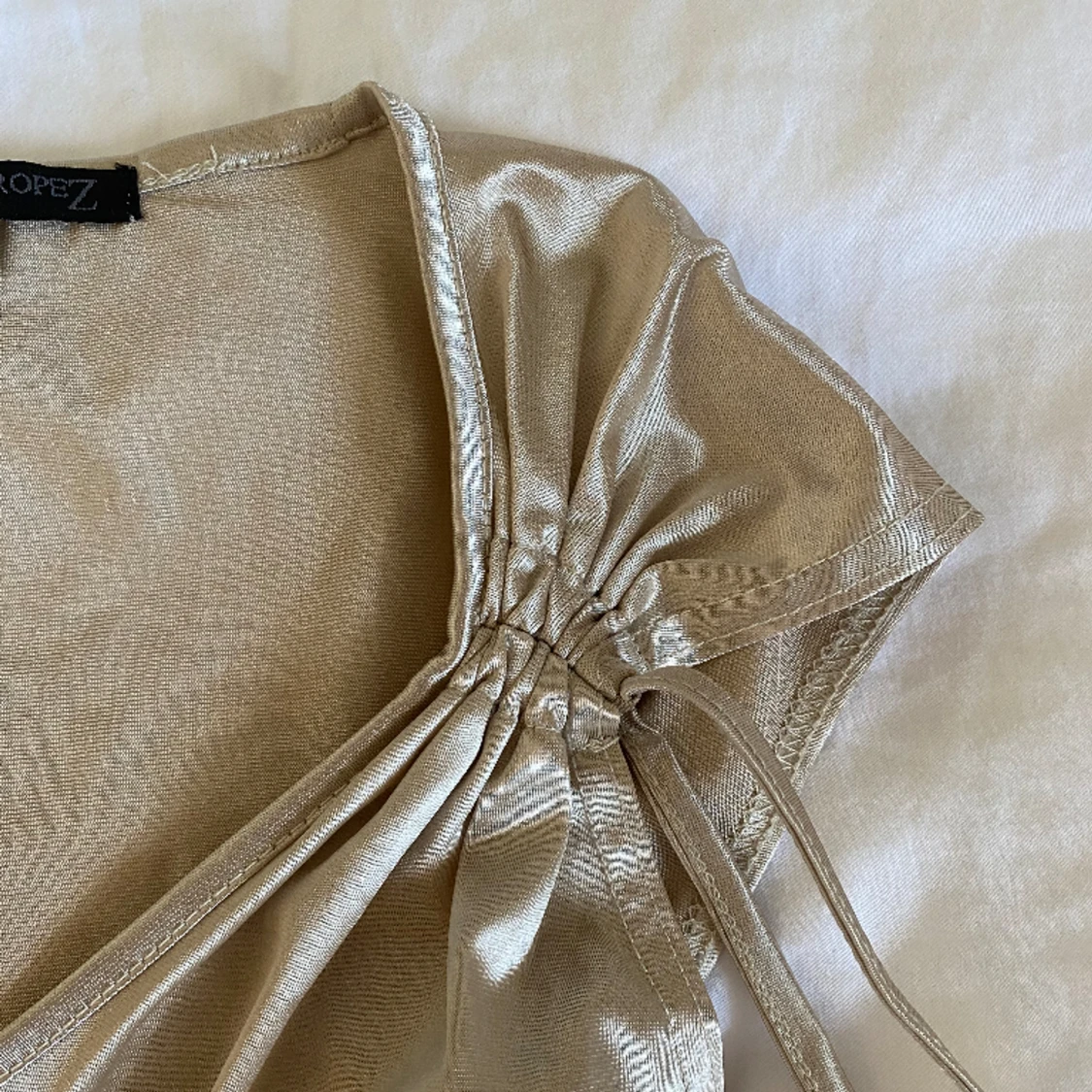 Guldig festtopp - 90