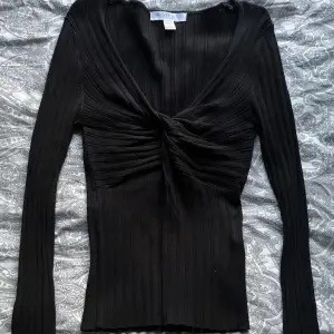 topp med knytning från New yorker!