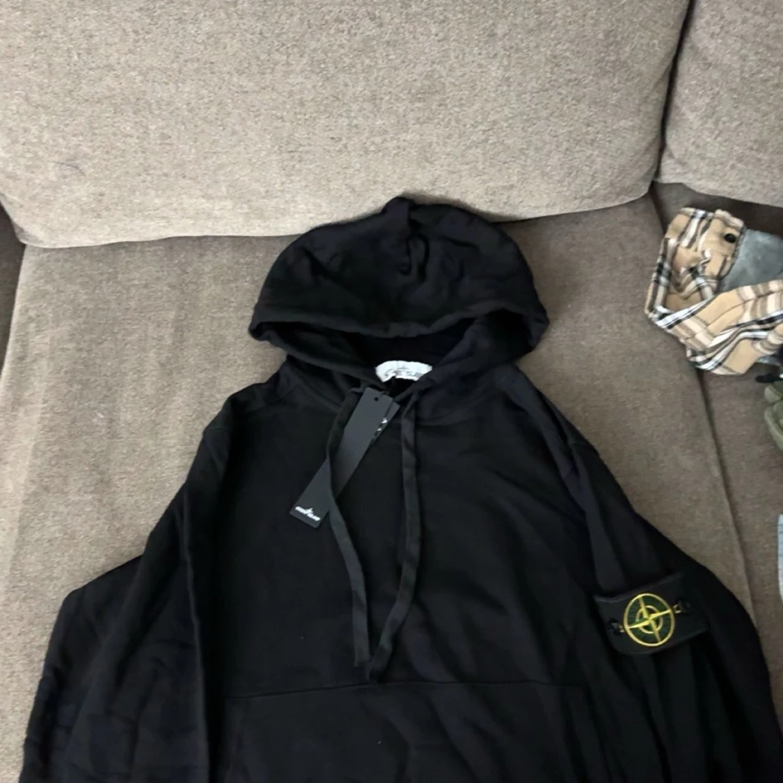 Svart hoodie från Stone Island