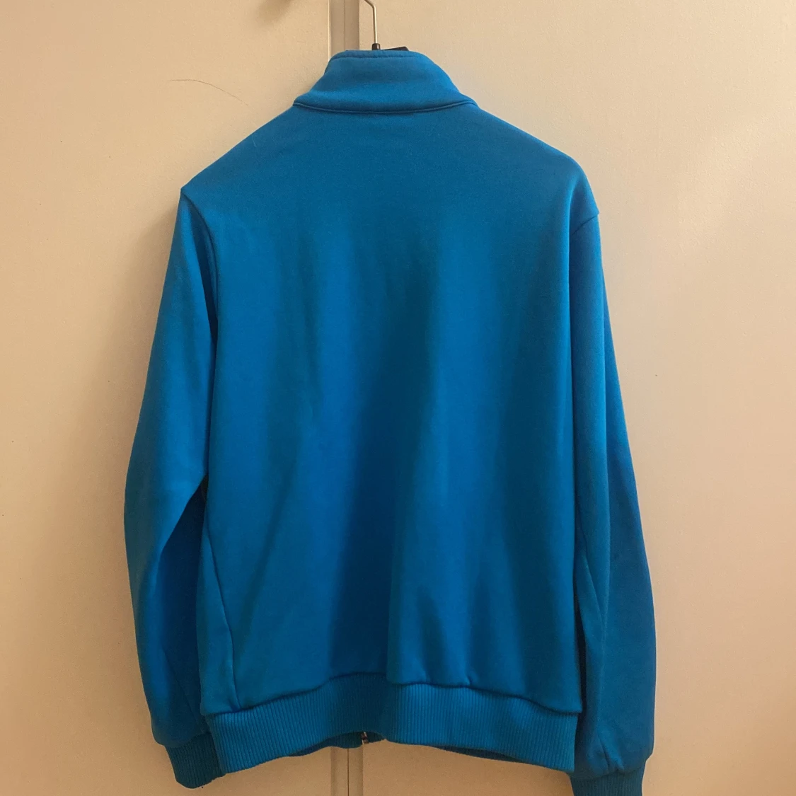 Blå träningsjacka från Adidas - 90