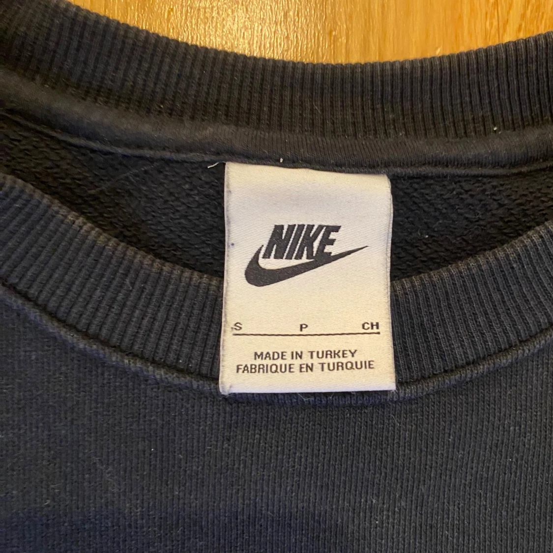 Svart vintage sweatshirt från Nike - 90
