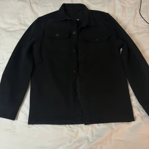 Svart kappa - Använd fåtal gånger 