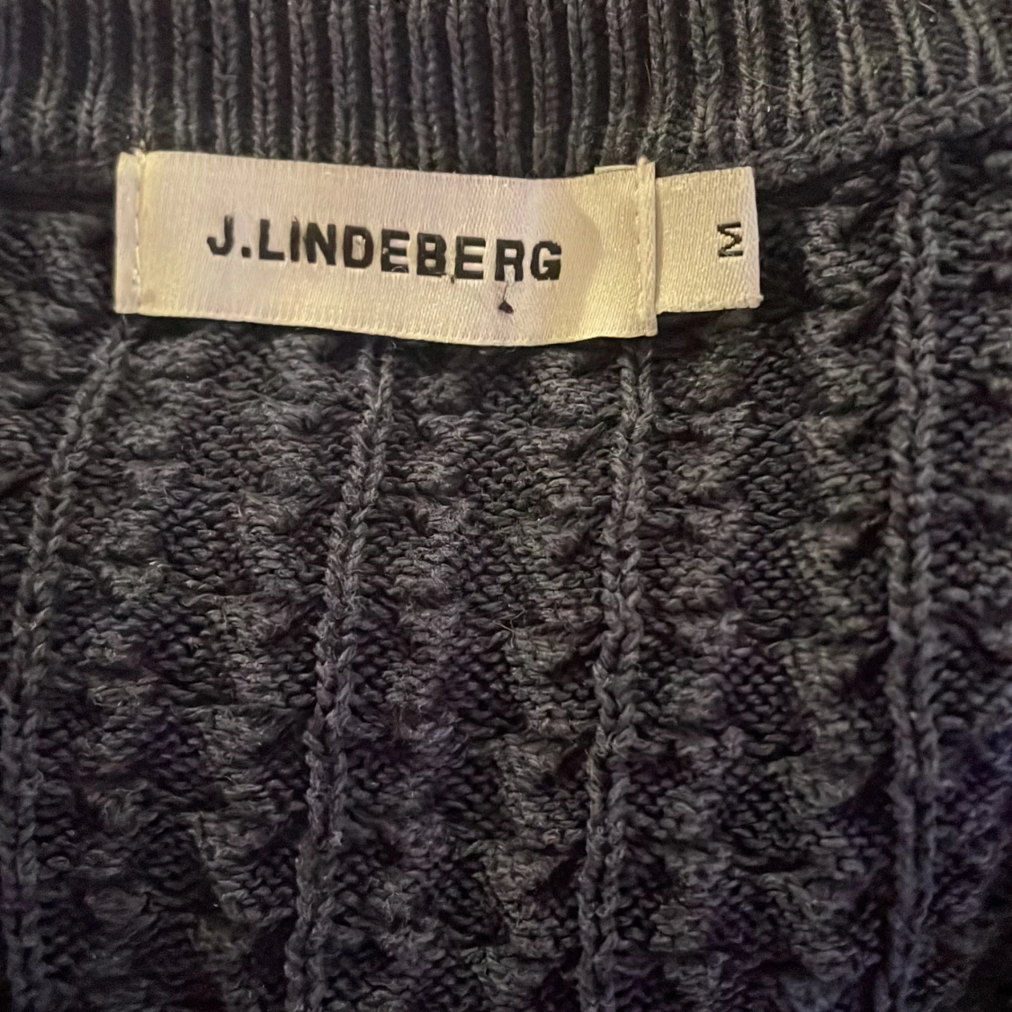 Mörkblå stickad tröja från J.Lindeberg - 92