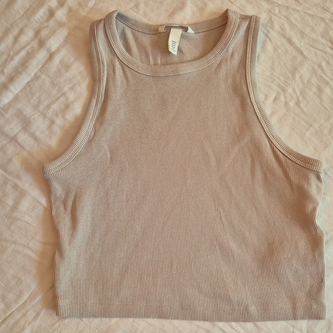 Beige ribbad linnetopp från H&M