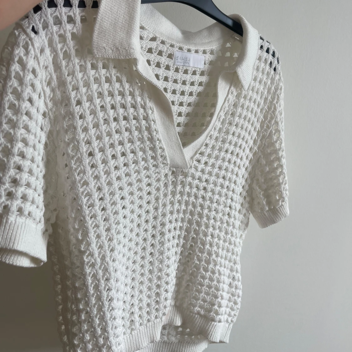 Vit stickad kortärmad tröja
