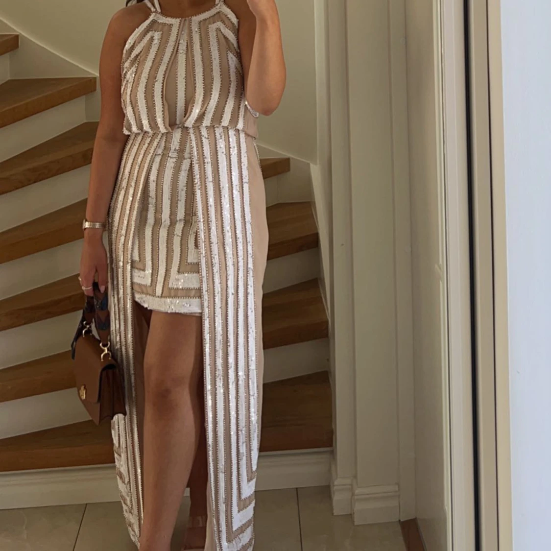 Glittrig randig klänning med slits