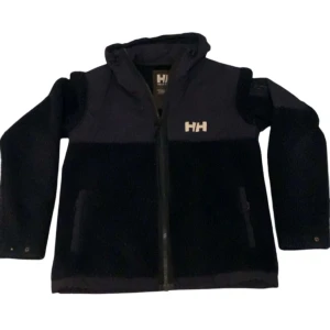 Svart fleecejacka från Helly Hansen - Säljer en svart fleecejacka från Helly Hansen med dragkedja och huva. Jackan är sparsamt använd. Den är långärmad och har en normal passform.