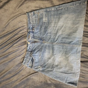 Jeanskjol från Vila - Kort jeanskjol från vila i storlek L